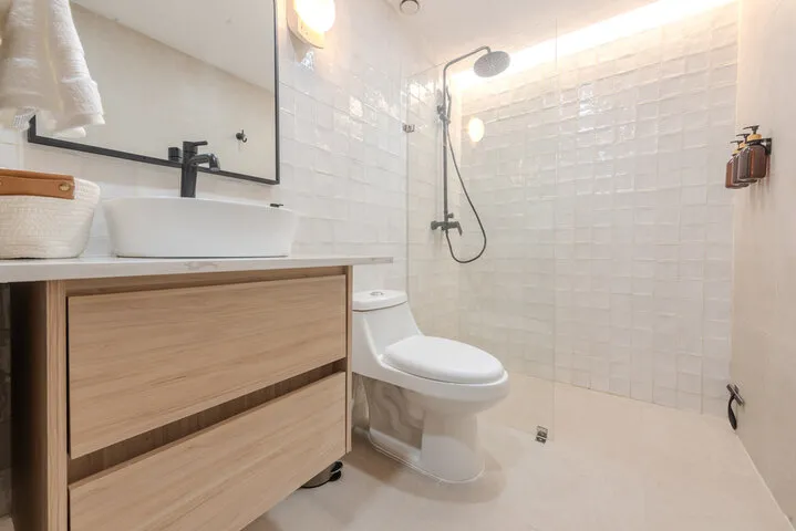 Custom shower remodel with built-in niche and modern tile in Madison WI