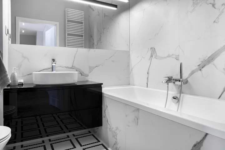 Tub removal and shower installation process in a Madison home