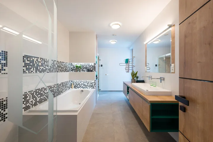 Licensed Madison WI bathroom contractors installing a walk-in shower