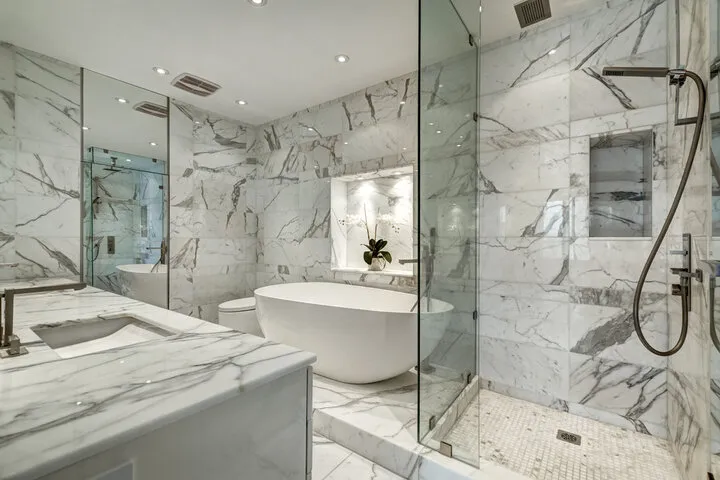 Very small bathroom remodel with compact sink and wall-mounted storage